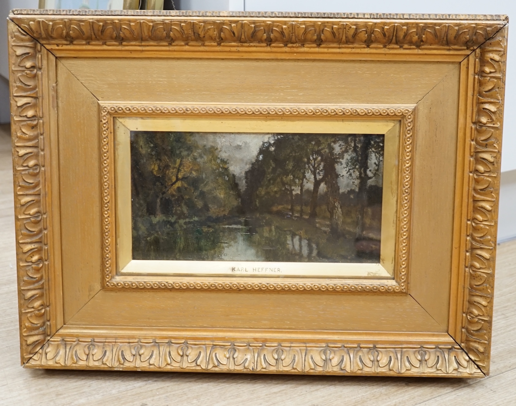 Karl Heffner (1849-1925), oil on artist's board, Study from nature, Bavaria, unsigned, inscribed to the mount, stencil verso 977J, 14 x 26cm, ornately framed. Condition - fair to good, a little dirty